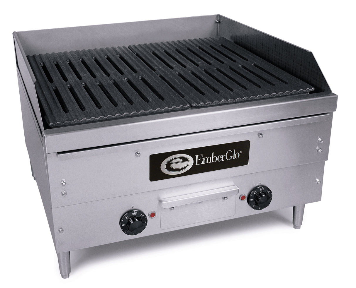 A commercial stainless steel EmberGlo countertop charbroiler with two black control knobs, a vented grill top, raised sides, back splash guard, and sturdy legs. The front displays the EmberGlo logo in black and white.