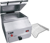 A stainless steel commercial countertop food warmer with an open hinged lid reveals a perforated inner tray. A removable wire rack sits to the right, while control buttons and a knob are on the front panel. The background is plain white.