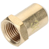 A close-up view of an Empura Equipment brass hexagonal nut with internal threading. The nut, used as an NG nozzle, lies on its side, showcasing the open threaded end and a smooth, angled body with a flat hex head. “3” is faintly visible on the surface.