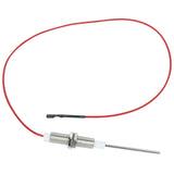A metal probe-style flame sensor with a red insulated wire attached. The cylindrical metal sensor features two nuts, white plastic ends, and a long thin rod extending from one side. The Empura Parts ECO-613 wire is coiled loosely beside the sensor.