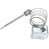 A metallic hi limit thermostat sensor with a long cylindrical probe attached to a flexible coiled wire and a rectangular silver control box. The box has a white label with text, common in Empura Equipment, and is mounted with a screw terminal on its side.