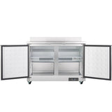 An Empura Refrigeration Undercounter Reach-In Refrigerator with 2 swing solid doors stands open, showing empty white shelves, visible insulation dots, and a lower vent. Four green casters support this clean, commercial unit.
