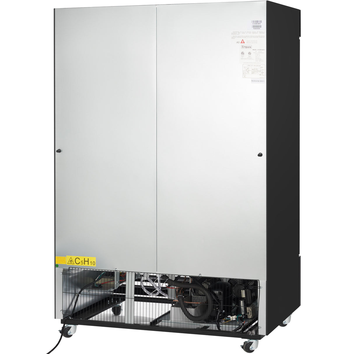 A large, industrial gray metal cabinet—resembling a commercial freezer—with its lower front panel open, revealing internal mechanical and electrical components. The unit has four wheels for mobility and a yellow caution label reading C.SH 10 on the lower left.