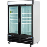 A commercial freezer with two glass doors, black trim, and white sides. The interior features adjustable white shelves and bright vertical LED lights. This glass door freezer sits on four caster wheels and has a vented black base for efficient cooling.
