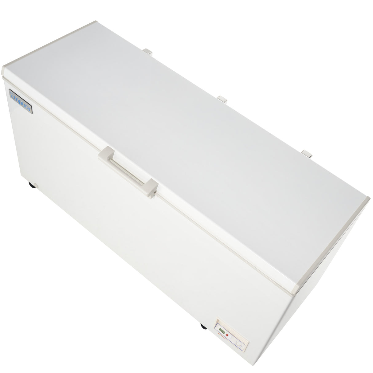 A large, white solid lid freezer with a rectangular handle in the center and a small control panel with indicator lights on the front bottom right. This chest freezer is placed on small wheels for easy mobility, ideal for any commercial kitchen.