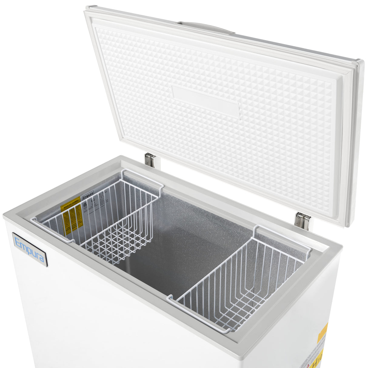A white Empura chest freezer with a solid lid open reveals a spacious, gray-lined interior and two removable wire baskets. The textured lid and Empura refrigeration label add to its practical design.