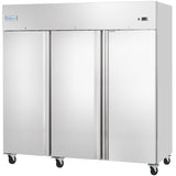 A large Empura Reach-In Freezer with a stainless steel exterior, 3 swing solid doors, reflective surface, caster wheels, and a small digital display on the upper right. Doors are vertically aligned for easy access.