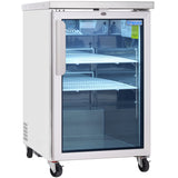 This Empura Refrigeration glass door cooler features a white exterior, silver handle, three wire shelves, and interior lighting. The single-door commercial unit stands empty on black casters, making it an ideal back bar cooler for any business.