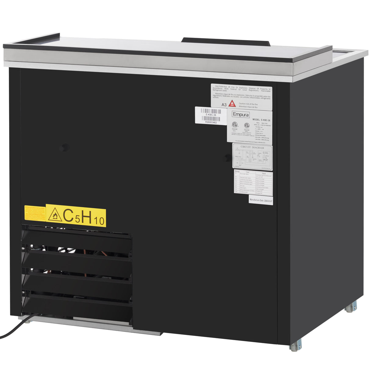 A black sliding door cooler with a flat silver top, ventilation grates at the bottom left, and several white information labels and warning stickers on the upper right. The front features a yellow caution sign with the chemical formula “C5H10.”.