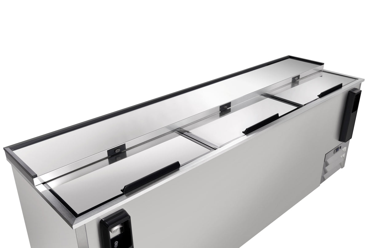 A stainless steel commercial food prep refrigerator with a sleek stainless steel exterior, three top-opening compartments, black handles, and a modern design. The lid is partially open, revealing the spacious 29 cu. ft. capacity storage area inside. Background is plain white.