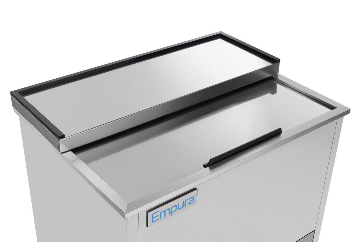 A stainless steel Empura refrigeration cooler with a sliding lid, labeled Empura on the front. The cooler features a black handle and raised edge on top, designed for use in food service or bar settings.