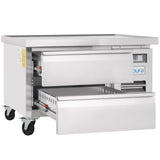 A commercial Empura Refrigeration stainless steel refrigerated worktable with two drawers, one open showing interior storage. It features sturdy caster wheels for mobility and a digital control panel, making it an ideal refrigerated equipment stand for food prep.