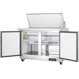 A commercial Empura Refrigeration Mega Top Prep Table with two open front doors and a top lid flipped up, revealing a shelf inside and a prep area above. The unit has four wheels for mobility and a digital control panel at the bottom right.