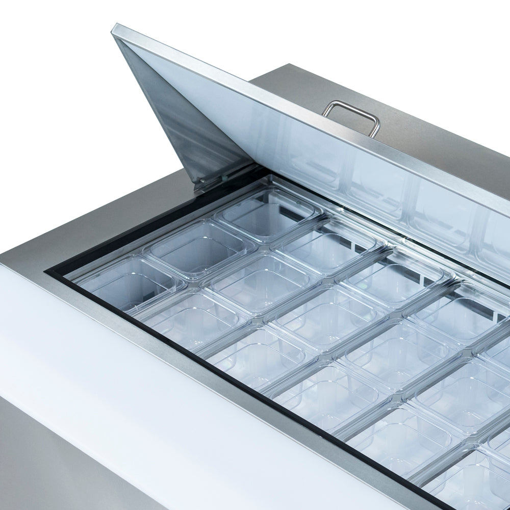 A stainless steel Empura Refrigeration freezer with a hinged lid is open, revealing multiple rows of clear, empty rectangular containers arranged neatly inside—ideal for use with a Mega Top Prep Table or as a refrigerated sandwich prep table.