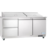 A large Empura refrigeration mega top prep table with two lid covers, two drawers, and one door below, all mounted on four wheels. The stainless steel refrigerated sandwich prep table features the Empura brand name on the bottom right corner.