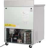 A large, gray Empura Undercounter Reach-In Freezer on wheels. The lower section is open, revealing electrical components and copper coils behind a black grille. Labels and warning stickers, including a yellow C5H10, are visible on the exterior panel.