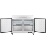 A stainless steel Empura refrigeration work top freezer with two doors swung open reveals empty shelves and a vented cooling unit. The dimpled doors and small caster wheels enhance utility, while a digital control panel sits at the bottom right.