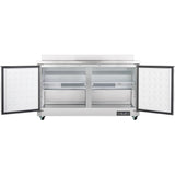 A stainless steel Empura Refrigeration work top freezer with two open doors reveals empty white shelves and an interior fan vent. The unit is on wheels, features an electronic control panel at the bottom right, and has a raised back edge on top.