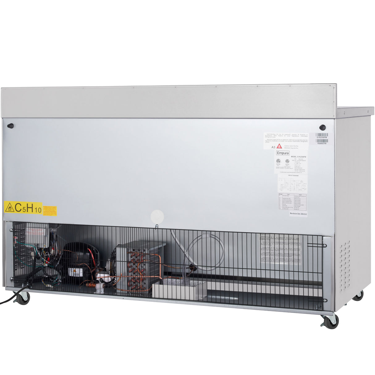 A large Empura Refrigeration work top freezer on wheels, viewed from the back. The metal panel is partially open, revealing electrical components, wiring, and a cooling system. Warning and information labels are visible on the surface.