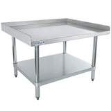A stainless steel work table with an NSF stainless steel top shelf, sturdy round legs, and an undershelf for extra storage. Clean and metallic, this Empura equipment stand features adjustable feet and raised edges on three sides.
