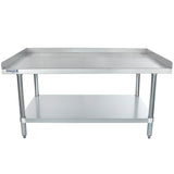 A stainless steel work table with NSF certification, featuring a raised back and side edges, an open lower shelf, and sturdy cylindrical legs. Clean and industrial in design, it's ideal as an equipment stand for kitchens or food prep areas. Empura brand on left side.