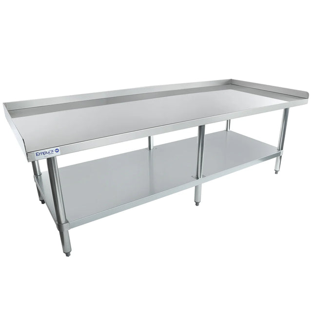 A long, NSF stainless steel commercial work table with a backsplash on three sides, an open lower shelf for storage, and four sturdy legs. The smooth surface is ideal as an equipment stand for kitchen or industrial use. The Empura label is visible on the side.