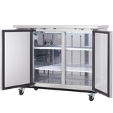 A stainless steel Empura Refrigeration commercial refrigerator with two doors open, revealing wire shelves inside. The fridge has wheels for mobility and a clean, reflective interior. The flat top surface resembles that of a back bar cooler and the unit is empty and well-lit.