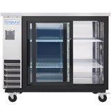 An Empura Refrigeration Back Bar Cooler with stainless steel finish, sliding glass doors, wire shelves, and caster wheels is shown empty and clean. The left-side cooling unit has vents and a digital display; the illuminated interior features two wire shelves per section.