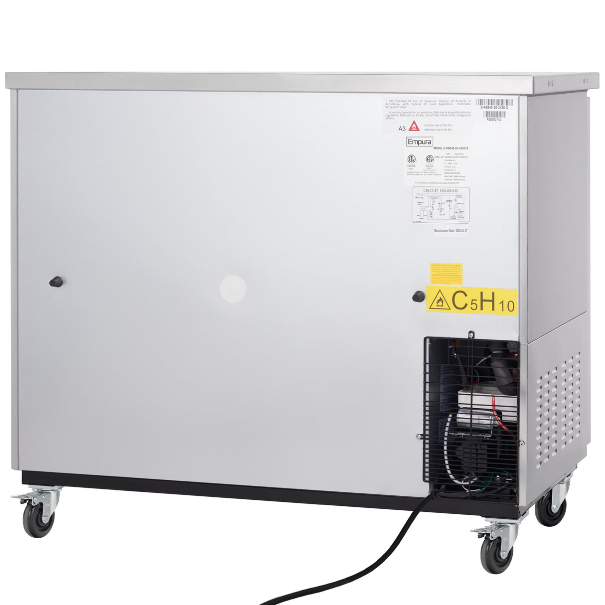 A large, rectangular metallic Empura Refrigeration unit with wheels, a visible control panel, and black power cord. The lower right corner is open, revealing internal machinery. Warning labels, including a yellow flammable gas sign (C5H10), are displayed on the front.