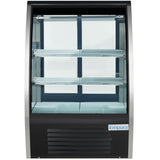 A commercial Empura Refrigeration deli display case with a curved glass front, two glass shelves, and a black and silver frame. The well-lit, empty interior is perfect for showcasing food or beverages. Brand name "Empura" appears at the bottom right.