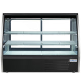 A large, empty refrigerated deli display case with a curved glass front, two interior glass shelves, and a black base. The brand name Empura appears on the lower right corner. LED interior lighting illuminates the clean white shelving and back panel.
