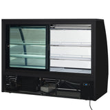 A black refrigerated deli display case with sliding glass doors and empty glass shelves. The lower front panel reveals cooling components, while an electrical cord at the bottom right and LED interior lighting highlight its powered design.