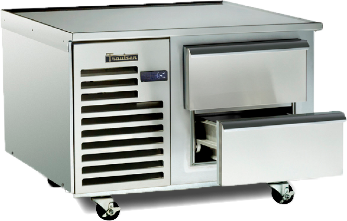 A stainless steel commercial refrigerator with self-contained refrigeration sits on wheels, featuring two horizontal pull-out drawers—one partially open—and a vented section with a Traulsen logo. The appliance is clean, industrial, and ideal as a freezer equipment stand.