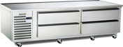 A commercial stainless steel freezer worktop with four pull-out drawers and self-contained refrigeration, featuring a vented cooling unit on the left, small digital display, and caster wheels for mobility—ideal as a Spec-Line Freezer Equipment Stand.