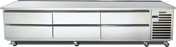 A large, stainless steel refrigerated equipment stand with six pull-out drawers and vented panels on the right side, set on four lockable caster wheels. Its flat surface doubles as a countertop and offers high pan capacity for busy professional kitchens.
