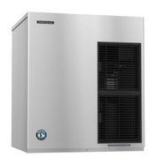 A stainless steel commercial cubelet-style ice maker with a rectangular shape. The front features two black vented panels, one above the other, and a small round logo near the bottom. The Hoshizaki brand name appears on the top left corner.