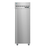 A tall, single-door Hoshizaki Steelheart Series Freezer stands upright on four small wheels. The reach-in freezer features a vented panel and a digital control display near the top, with a smooth metallic surface and vertical handle on the left.