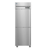 A tall, stainless steel reach-in freezer stands upright on four wheels. It has two vertical doors with horizontal handles and a digital display panel on the upper right side. The exterior is smooth and industrial in appearance.