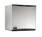 A sleek, modern stainless steel Scotsman Prodigy Plus Ice Maker with a smooth, rectangular front panel features the brand name at the top and a small digital display at the bottom left. The machine’s slight curves enhance its contemporary design.