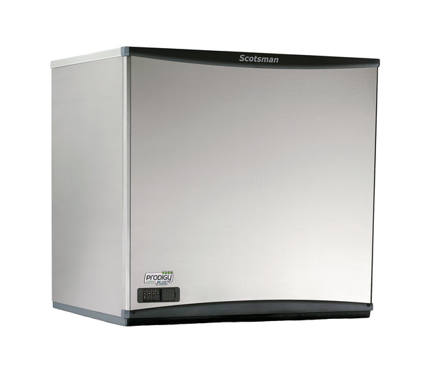 A stainless steel Scotsman Prodigy Plus flake ice maker features a smooth, curved front panel with a digital control display on the bottom left. This remote-cooled machine sports black trim at the base and a branded label at the top center.