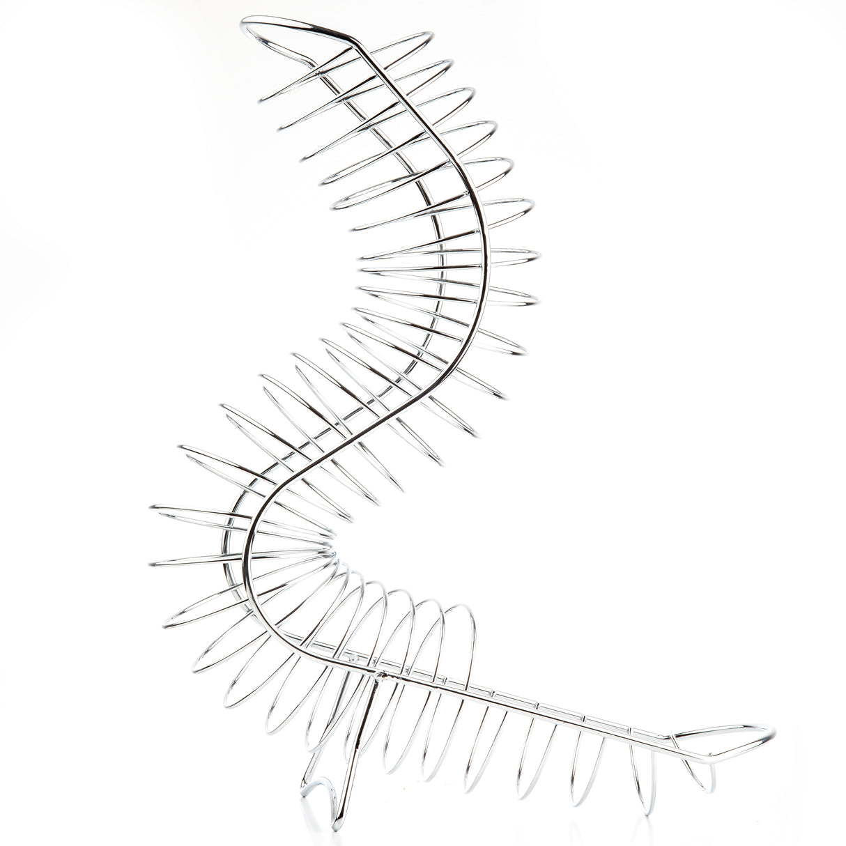A chrome plated fruit basket with a winding, S-shaped structure and evenly spaced, spiked prongs along both sides. Photographed on a white background, this TableCraft Products Meranda Fruit Basket exudes a clean and modern look.