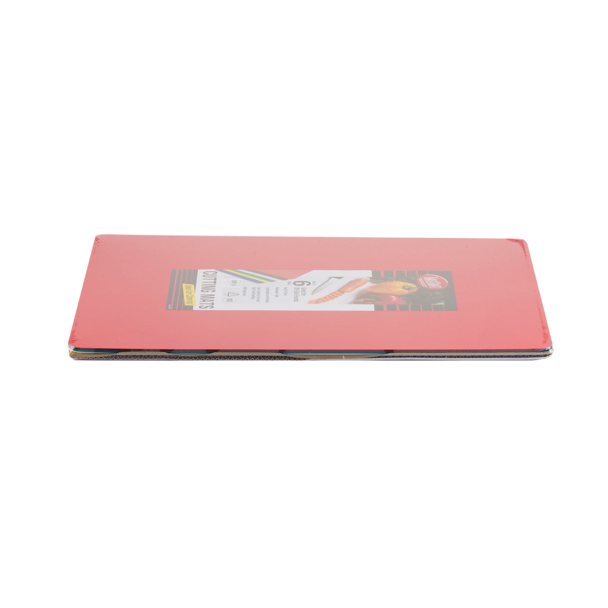 A flat, rectangular cutting mat with a red cover lies on a white background. A label with text and images is visible through the clear plastic wrapping, suggesting it's new, unopened, and features a flexible design.