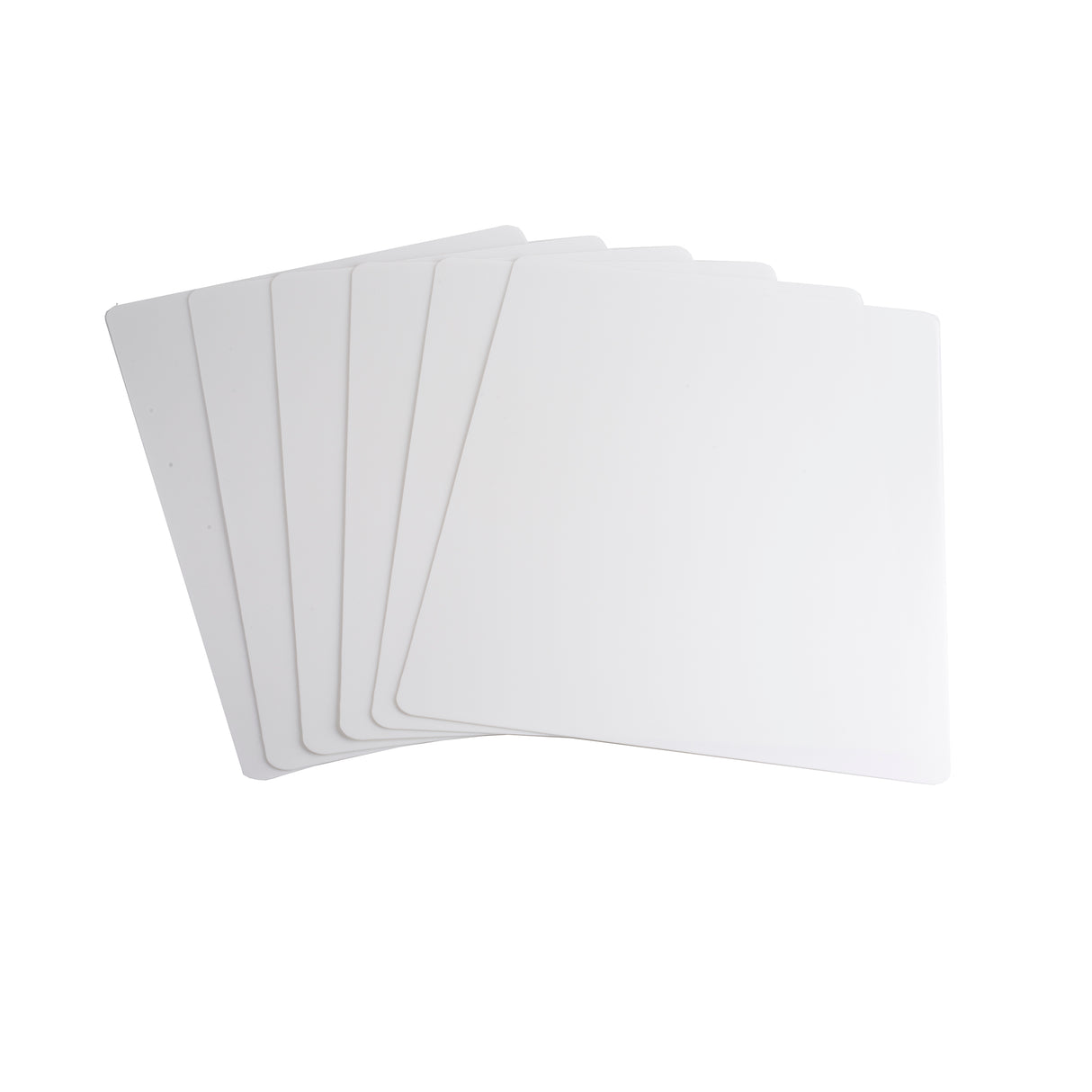 Six blank, rectangular white polyethylene sheets are fanned out on a white background. Each sheet, resembling a dishwasher safe cutting mat with rounded corners, is evenly spaced and slightly overlapping for a neat, organized arrangement.