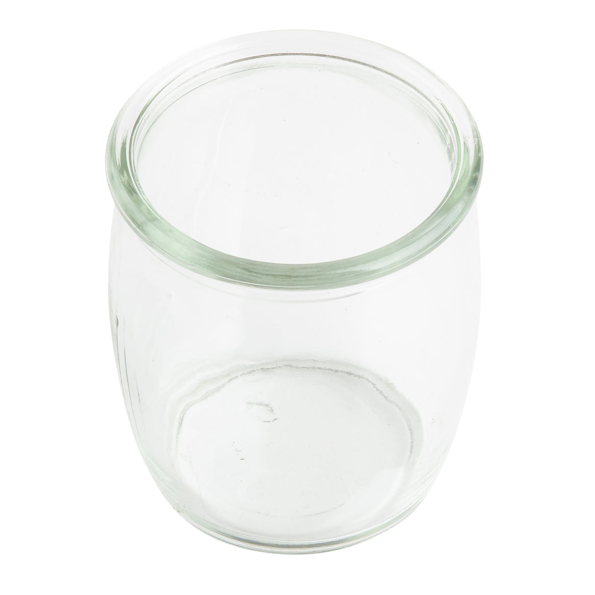 A clear, empty 4 oz glass jar is shown against a white background. The jar has a wide opening, rounded shoulders, and a smooth rim. Its transparent glass features subtle reflections, evoking vintage style glasses. No lids or markings are visible.