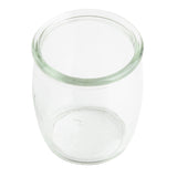 A clear, empty 4 oz glass jar is shown against a white background. The jar has a wide opening, rounded shoulders, and a smooth rim. Its transparent glass features subtle reflections, evoking vintage style glasses. No lids or markings are visible.