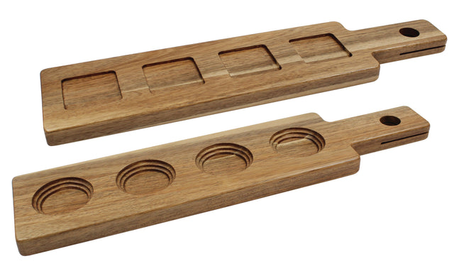 Two rectangular acacia wood paddle flight boards with handles and holes for hanging. The top has four square depressions, the bottom four round, perfect for holding glasses or cups. Smooth finish—ideal for cash & carry.
