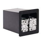 A rectangular black straw organizer with an open front reveals two inner compartments filled with shredded white paper. The box is angled, showing its depth and the division between the two compressed sections inside.