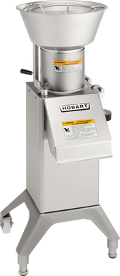 A Hobart FP300I continuous-feed food processor stands on three sturdy legs with casters, featuring a large funnel-like feed chute and front handle. With an 88 lb/minute production capacity, it’s ideal for demanding commercial kitchens.