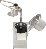 An industrial Hobart Food Processor with a hinged lid open to the right, exposing a black circular blade inside. It features a continuous feed design and an attached curved metal arm with a large handle for safe food pressing or feeding.