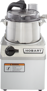 A commercial Hobart food processor with a clear lid, black handle, and sturdy stainless steel base. The front panel features a dial with Off and Pulse settings, a large HOBART logo, and a warning label about the sharp blade.